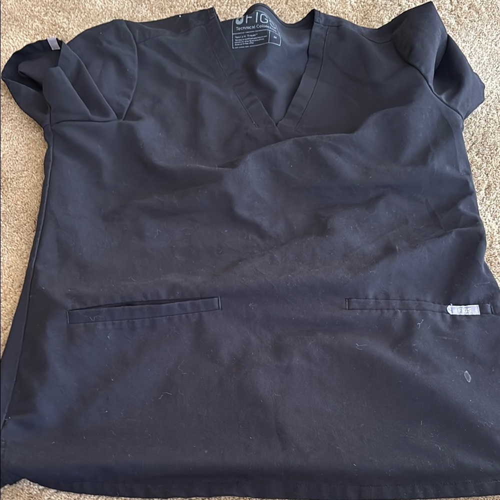Figs scrub top , Tiny bleach spot